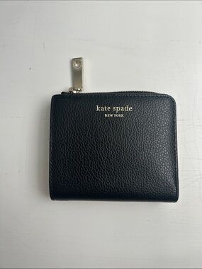 kate spade black pebbled leather zip-around wallet with gold hardware